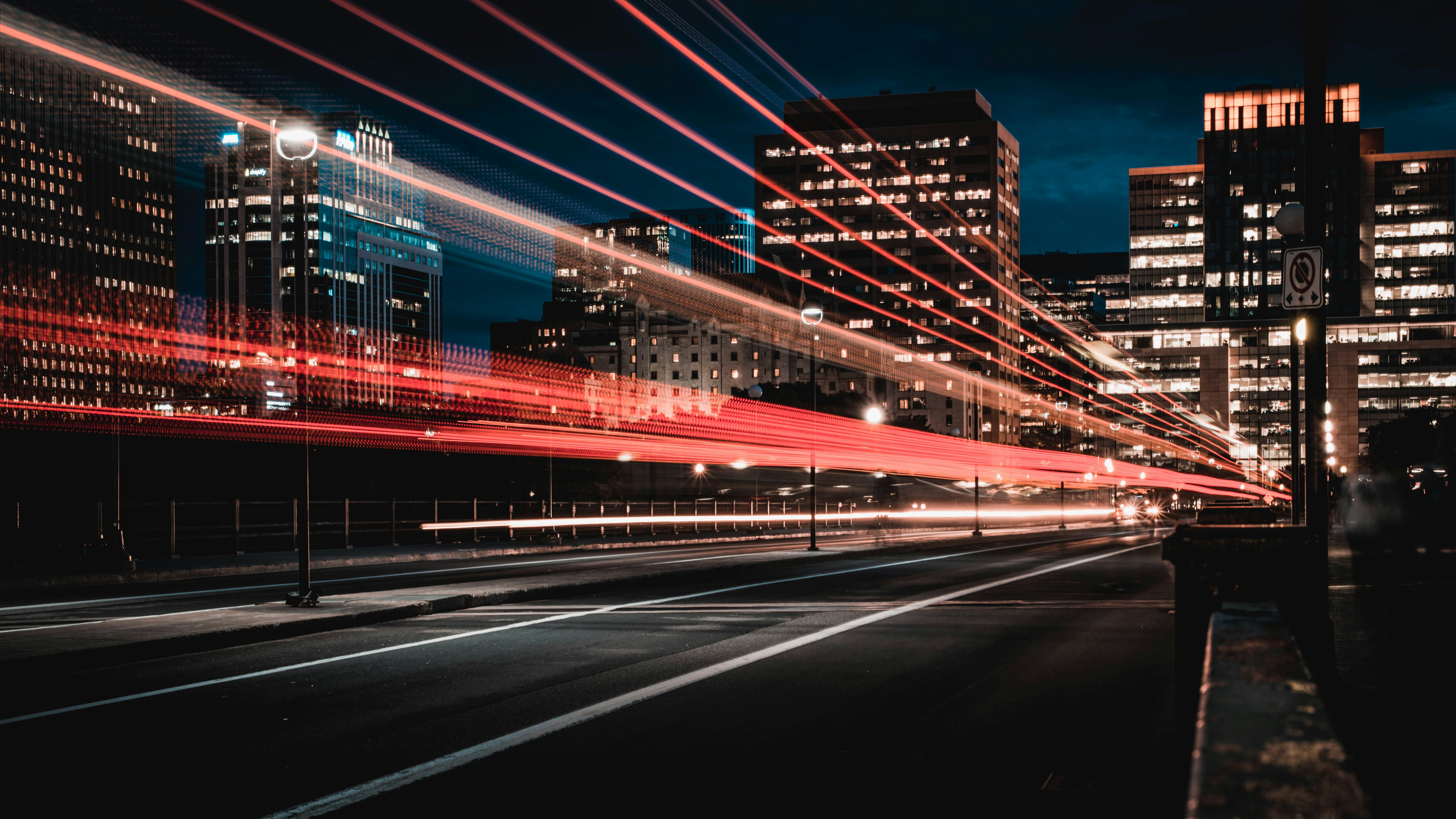 City road at night with light trails